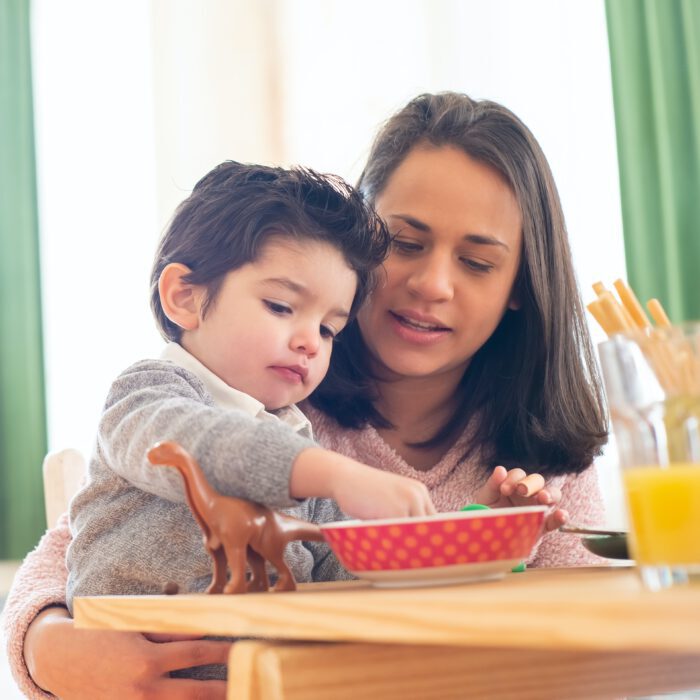 Mother with child while eating